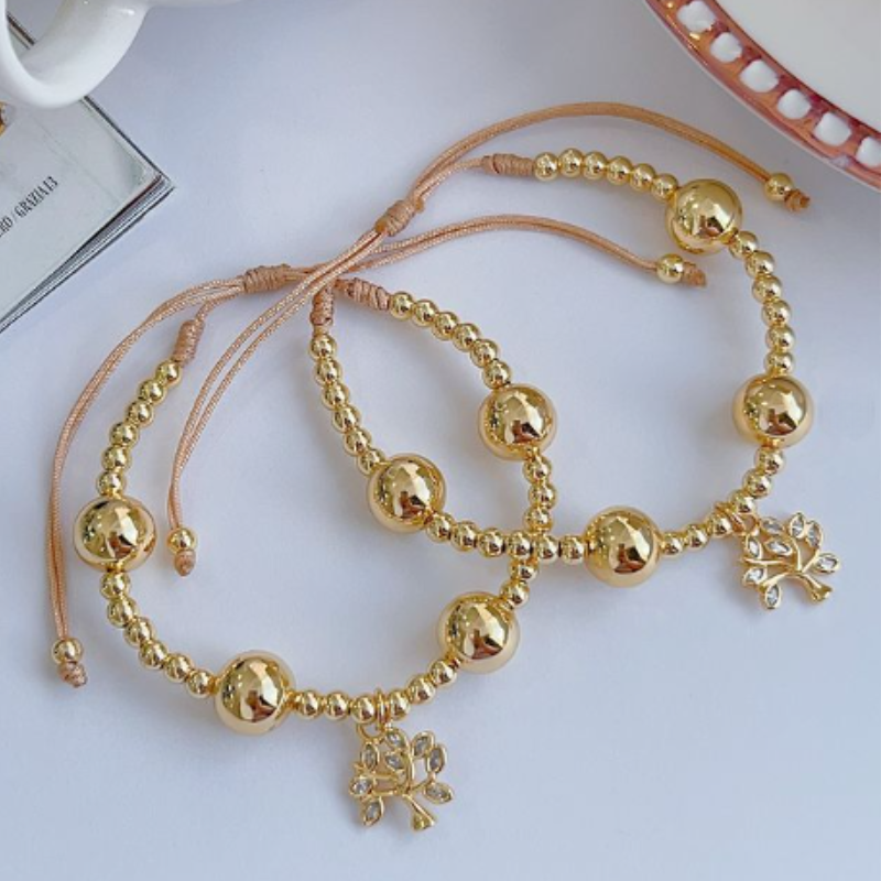 Pulsera dorada arbolito REF 1.054